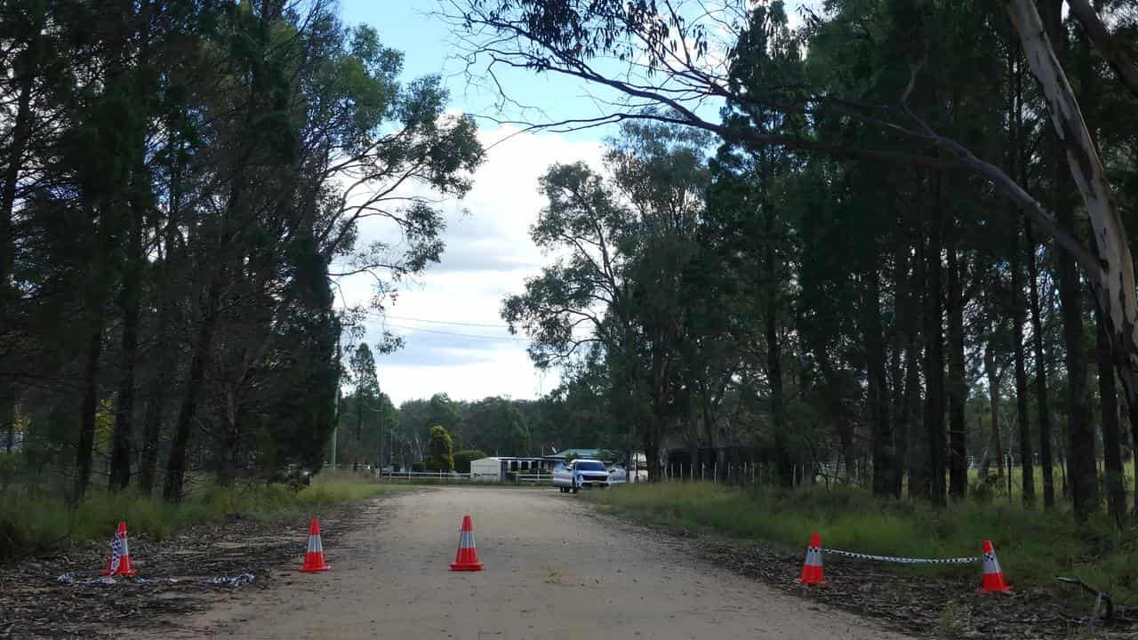 The scene near a house where two young boys were found dead.