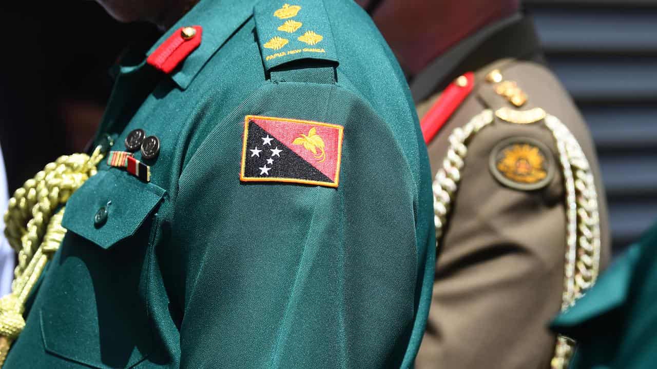 Defence uniforms of both Papua New Guinea and Australia