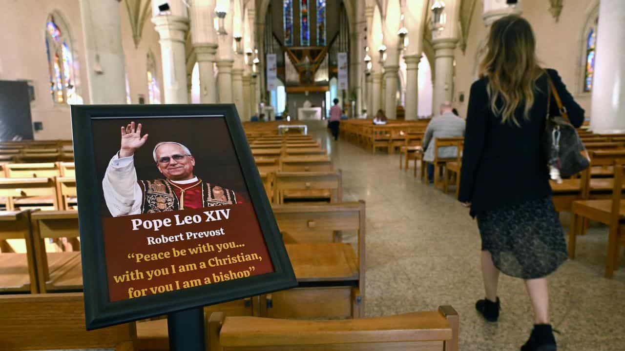 A portrait of Pope Leo XIV at St Stephen church in Brisbane