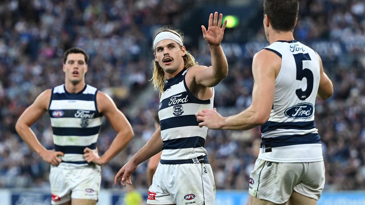 Bailey Smith (centre) and Jeremy Cameron (right)