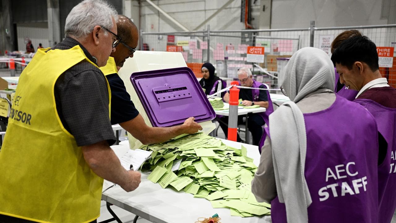 Australian Electoral Commission staff count ballots (file image)