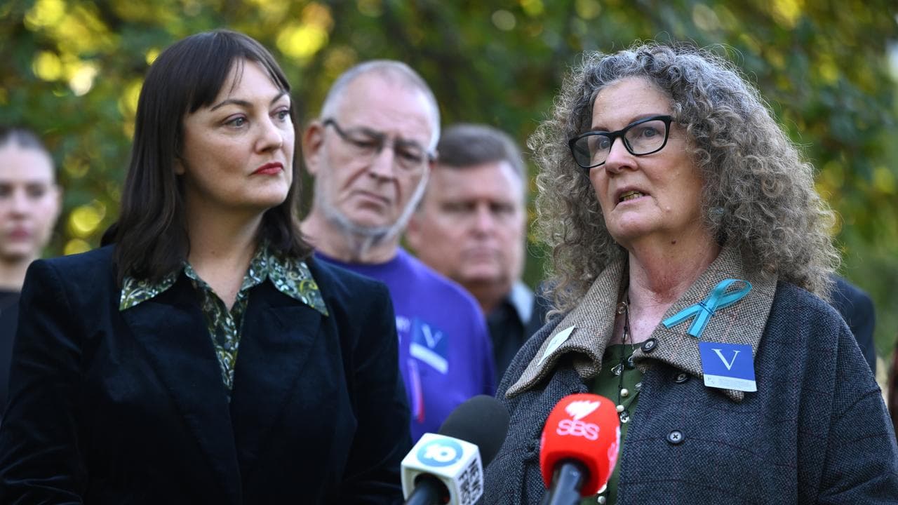 Karen Walker (right)