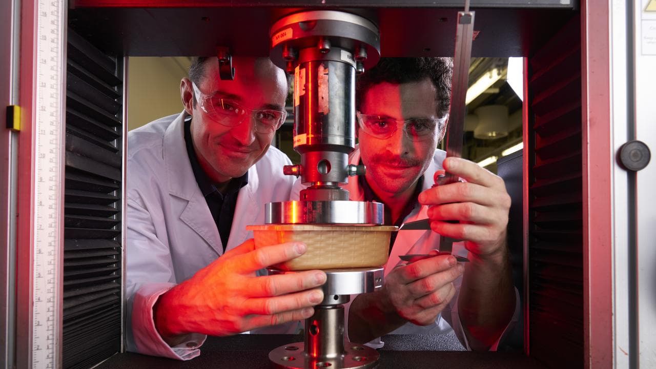 Luigi Vandi and Vincent Mathel testing bioplastic punnets