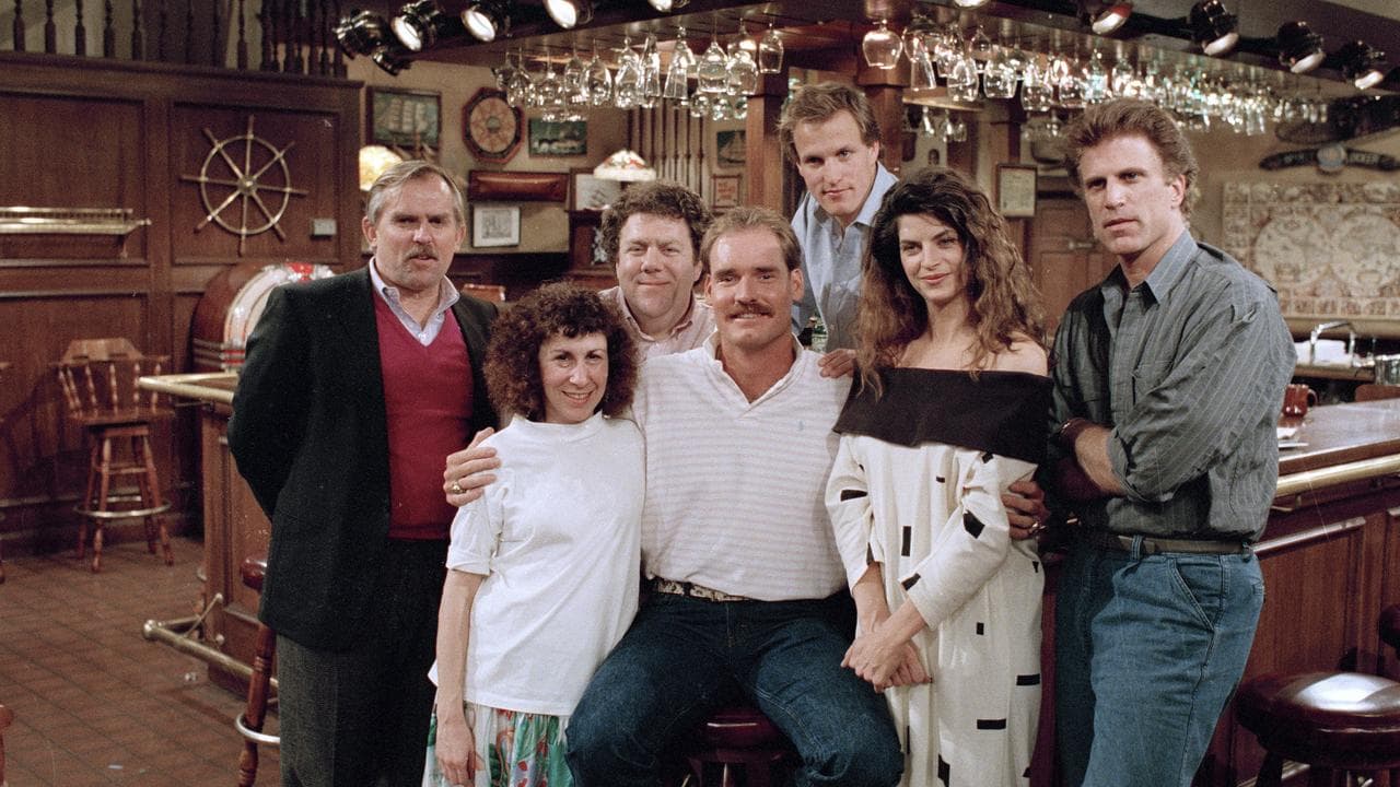 Baseball player Wade Boggs (centre) with the cast of Cheers in 1988