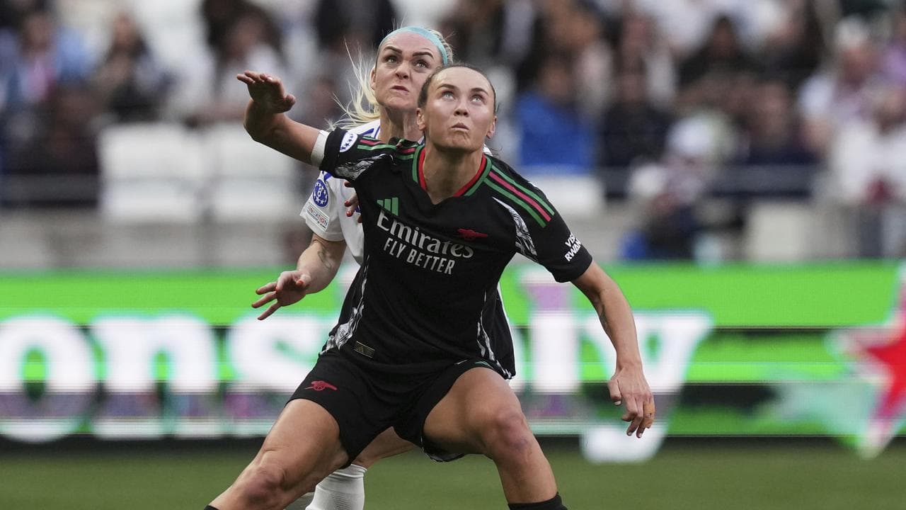 Arsenal's Caitlin Foord and Lyon's Ellie Carpenter