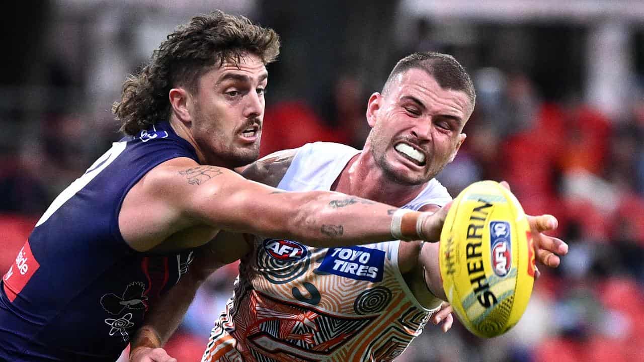 Luke Jackson of the Dockers contests