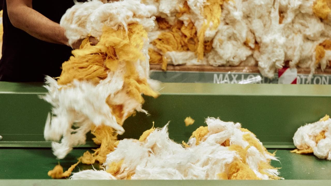 Wool being prepared for use in a sustainable textiles project
