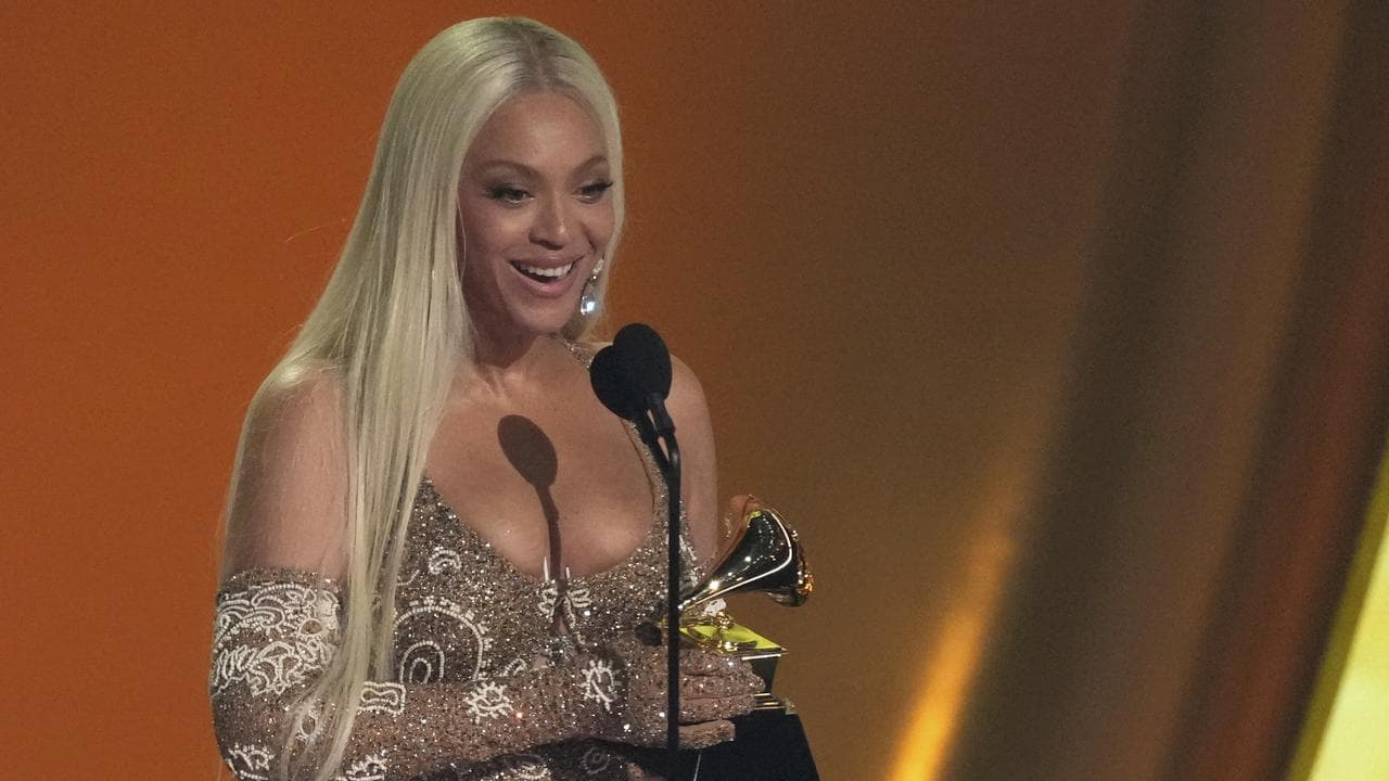 Beyonce accepts the award for best country album for 