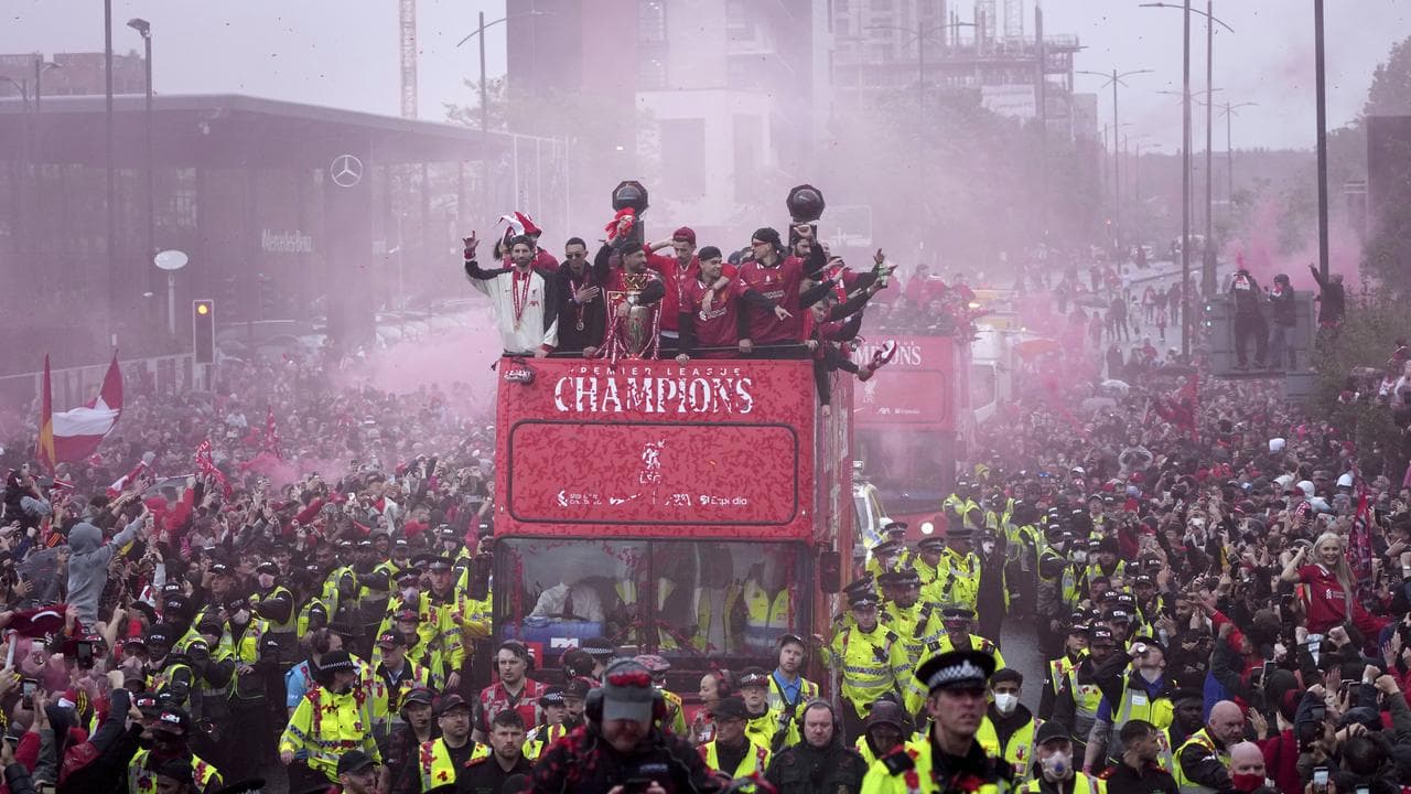 Liverpool players celebrate their Premier League victory
