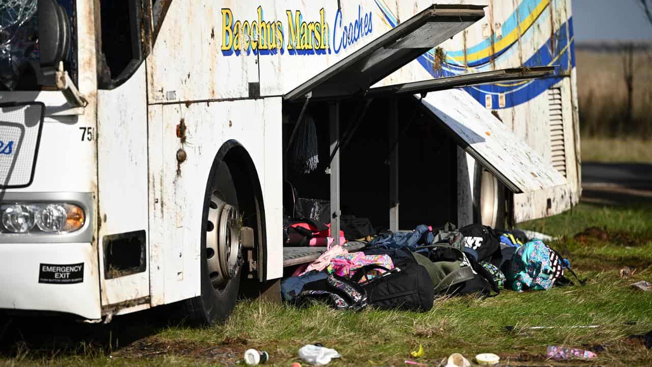Schoolbags at a crashed bus