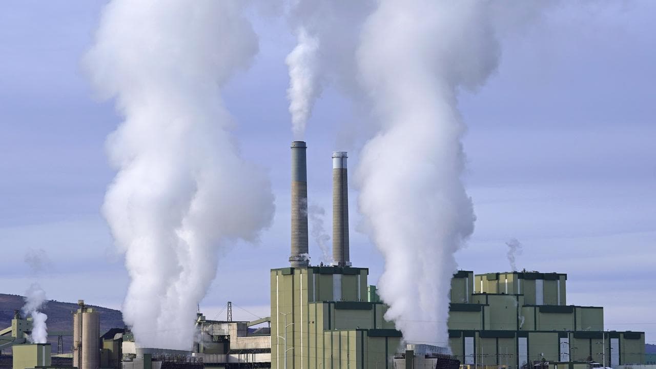 Steam from a coal fired plant.