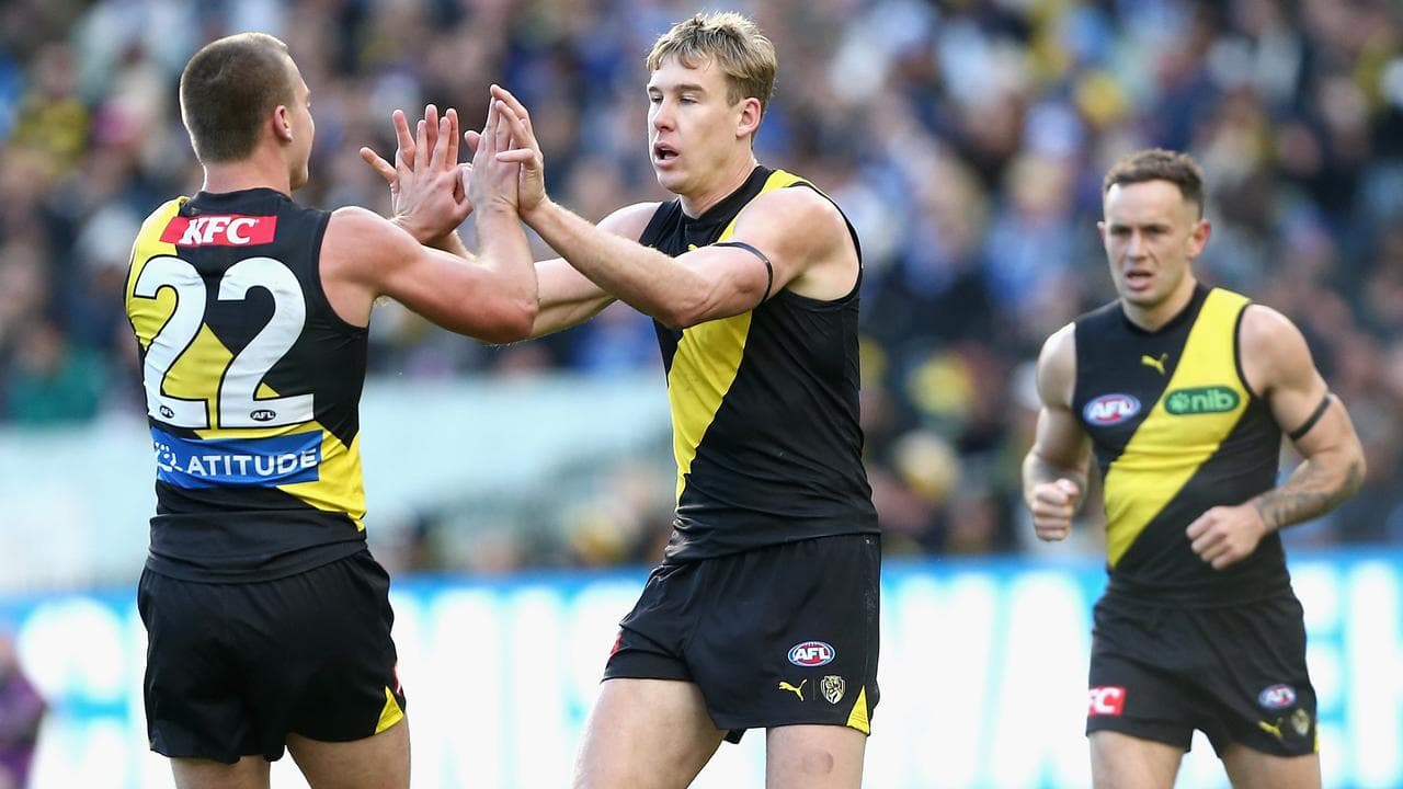 Key forward Tom Lynch (centre)