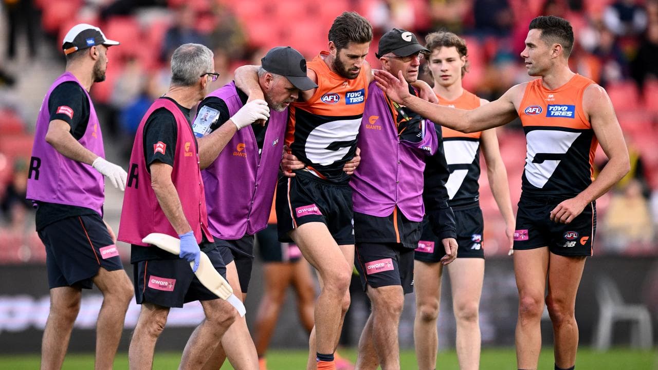 Josh Kelly (right) consoles Callan Ward