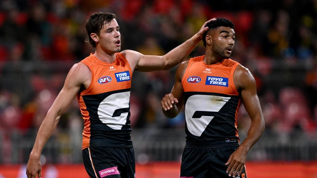 Aaron Cadman (left) congratulates Callum Brown