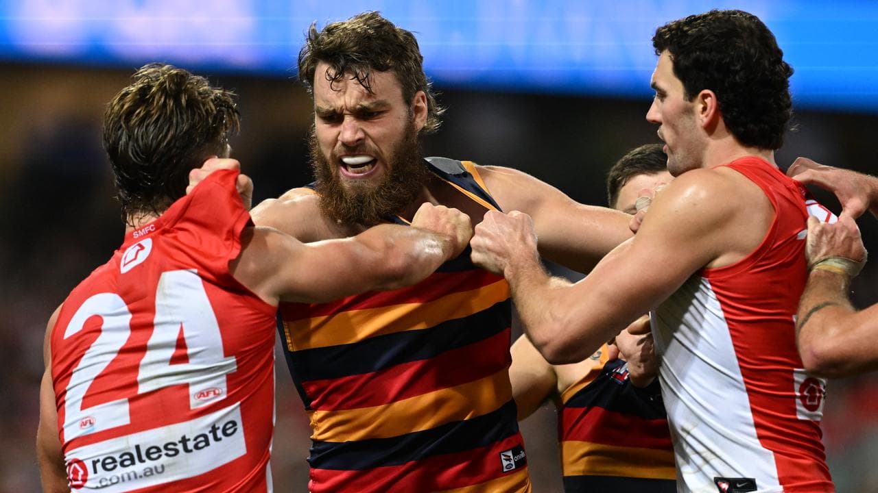 Sydney's Dane Rampe (left) and Adelaide's Riley Thilthorpe