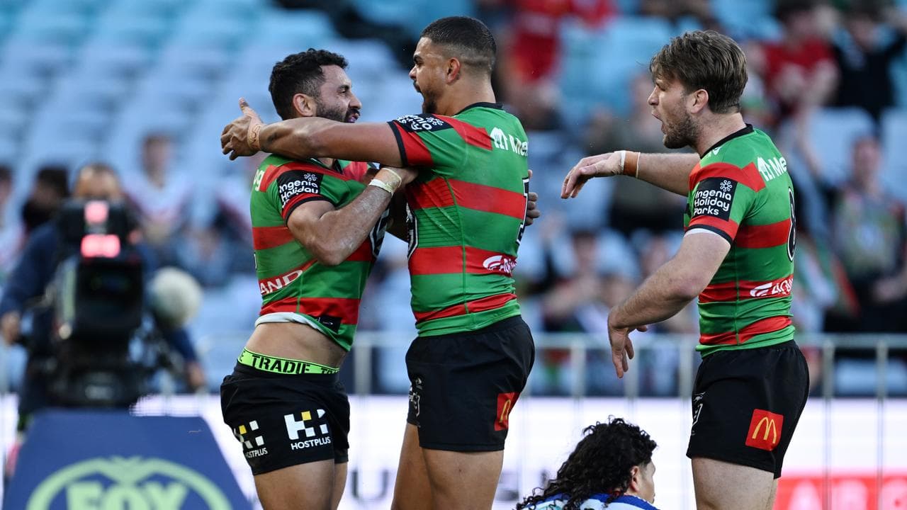 Latrell Mitchell (centre) and Alex Johnston (left)