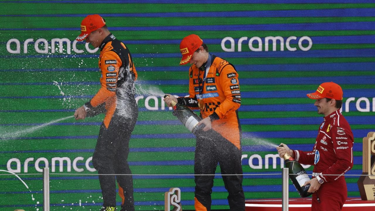  Oscar Piastri (c), Lando Norris (l) and Charles Leckerc