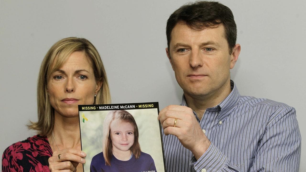 Kate and Gerry McCann with a computer generated image of Madeleine