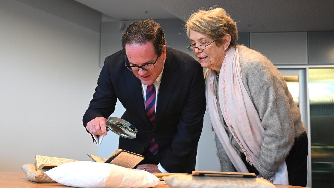 Veterans' Affairs Minister Matt Keogh reads a diary