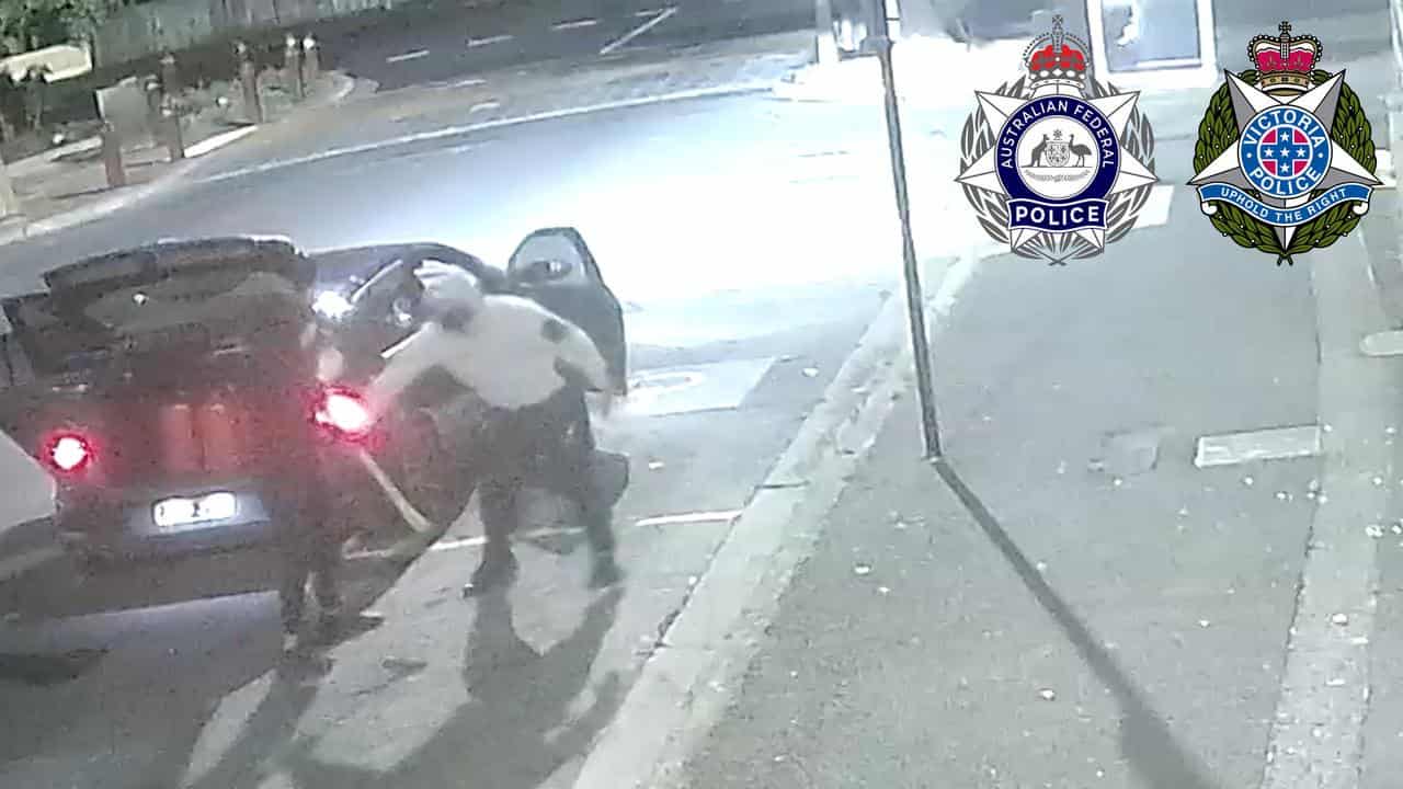 CCTV footage of masked and hooded men setting fire to a synagogue