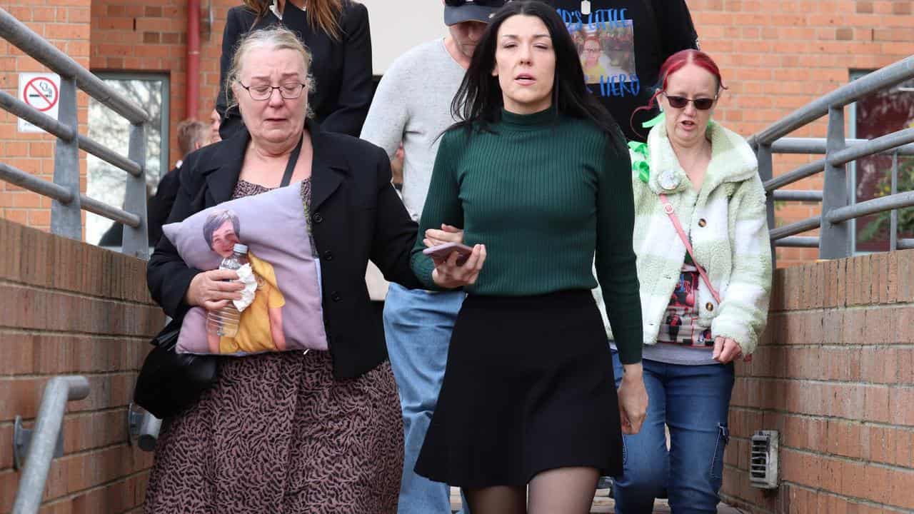Zane Mellor's mother Georgie Burt (centre)