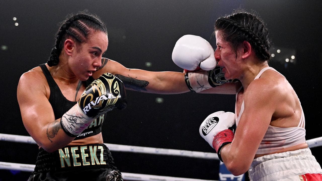 Cherneka Johnson (left)