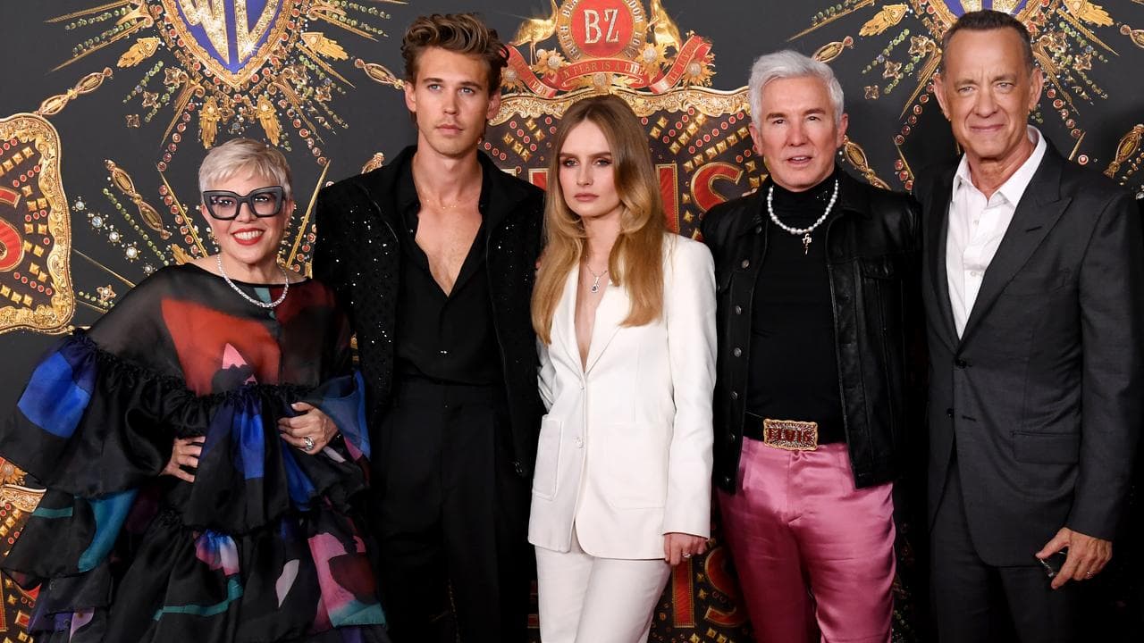 Catherine Martin and Baz Luhrmann with cast members from ELVIS.