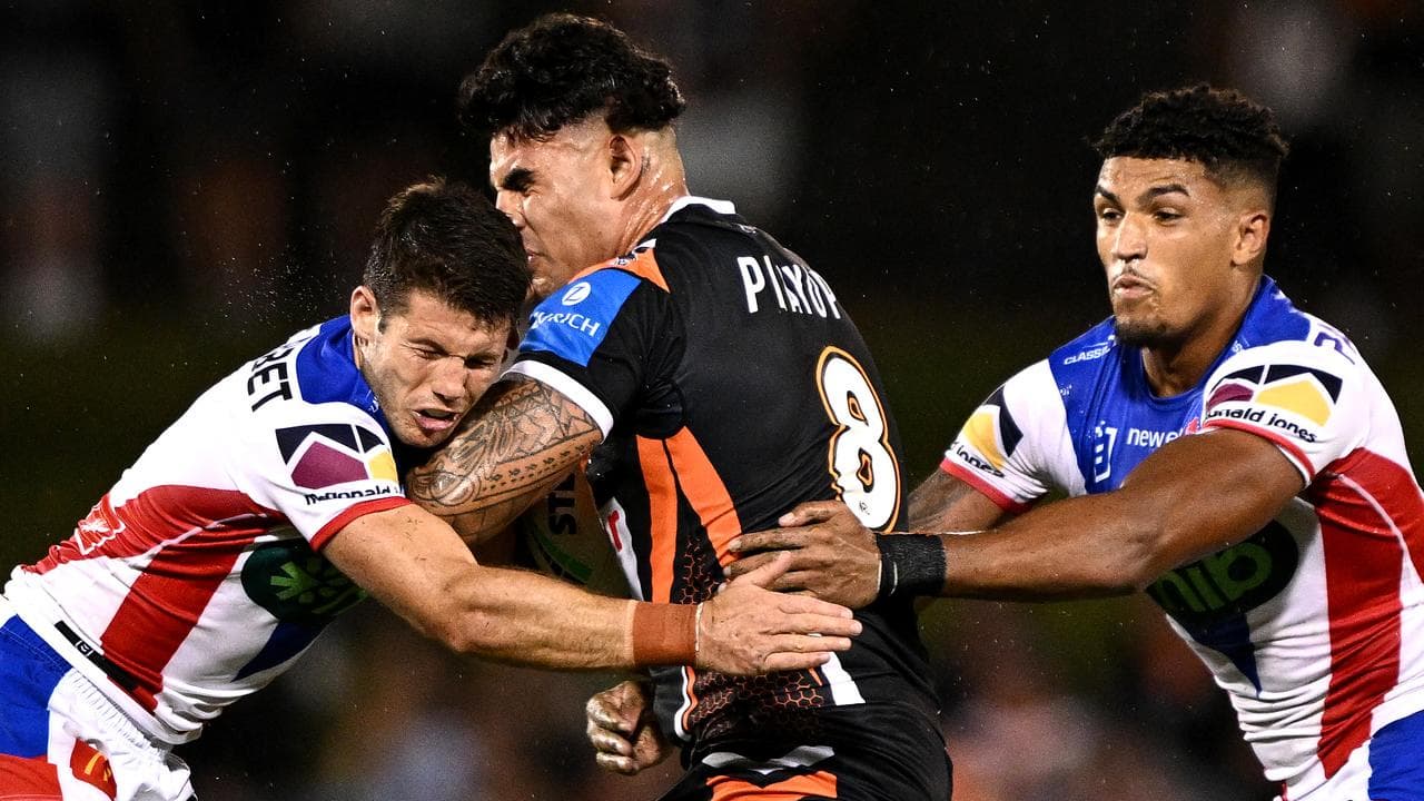 Terrell May of the Tigers is tackled