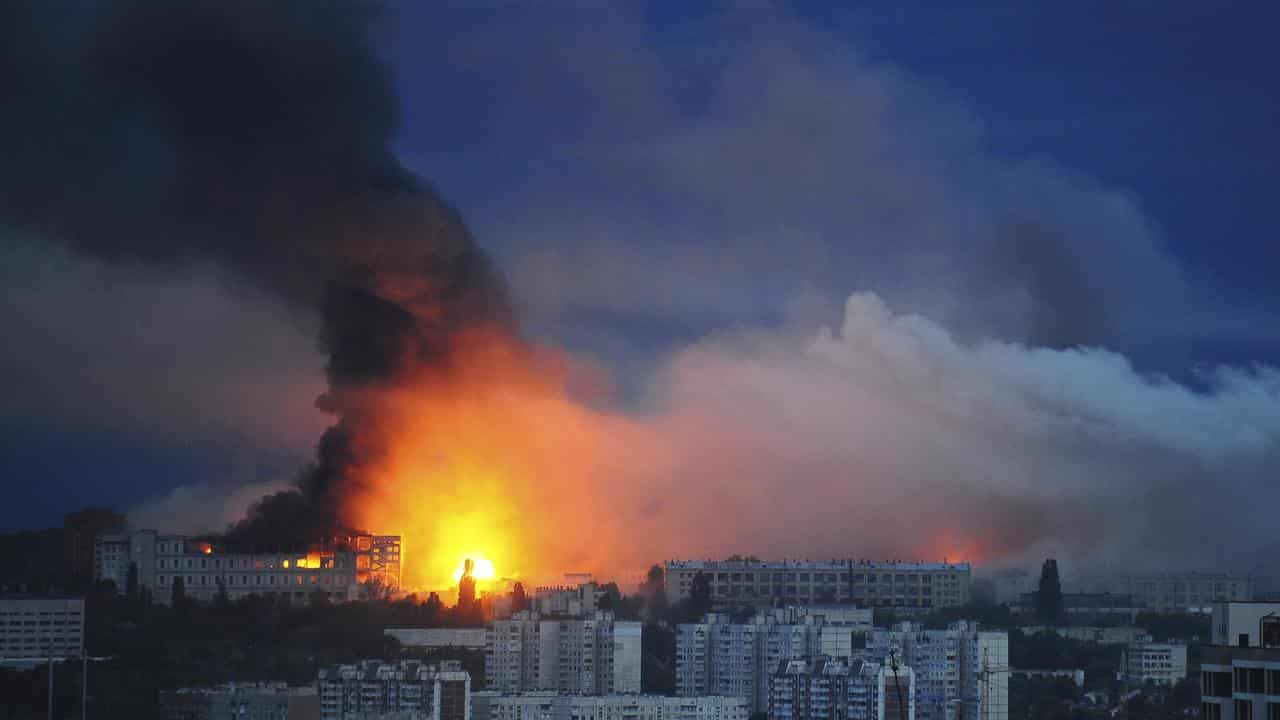 Smoke rises from the site where a Russian missile struck in Ukraine