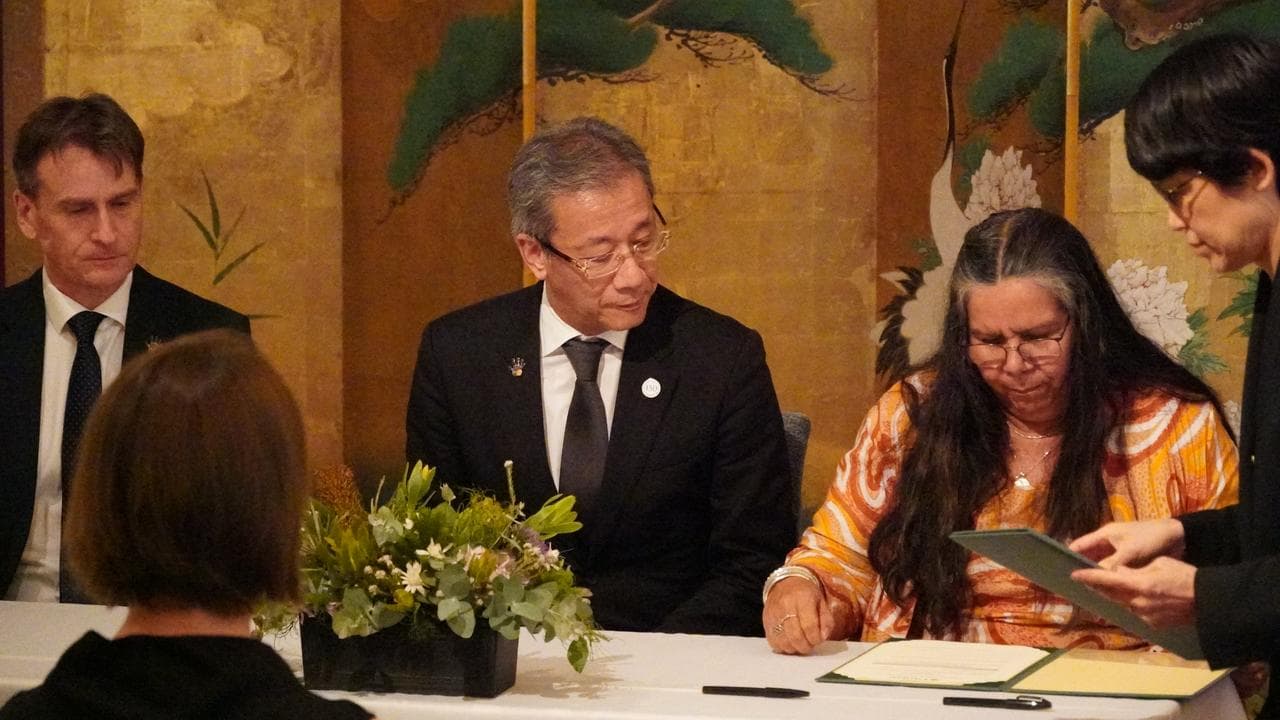 Tokyo University president Teruo Fujii and Kaurna elder Mitzi Nam