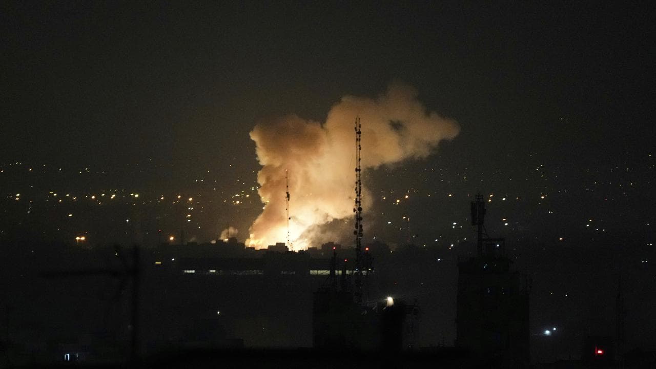 Smokes rises after an explosion in Tehran