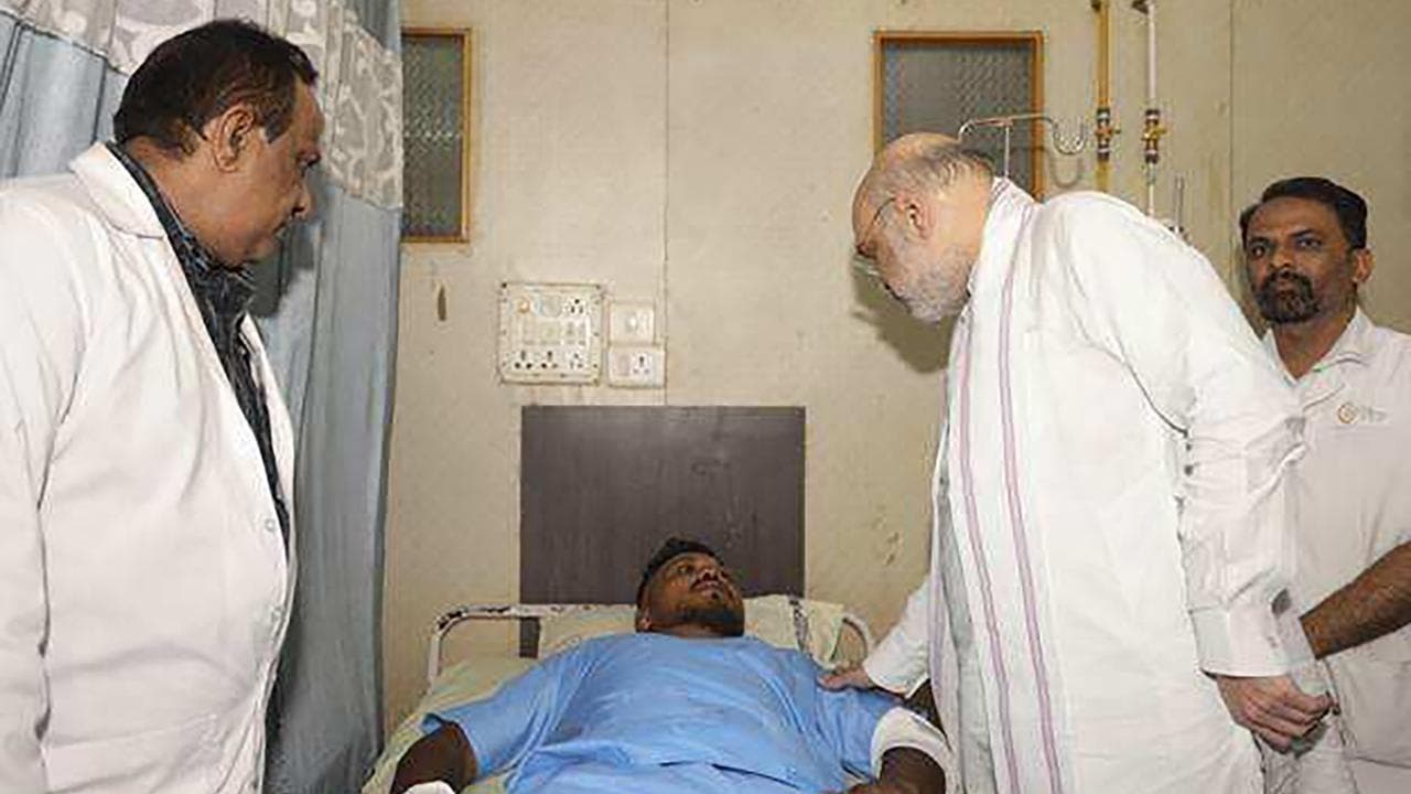 Home Affairs Minister Amit Shah meets survivor Viswashkumar Ramesh