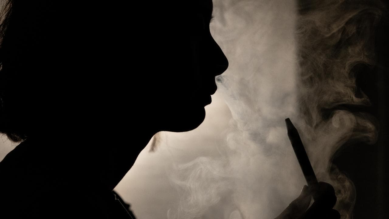 Person with a vape.