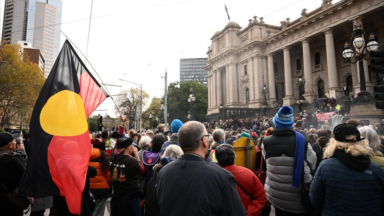 Supporters greet Yoorrook Justice Commission deputy Travis Lovett