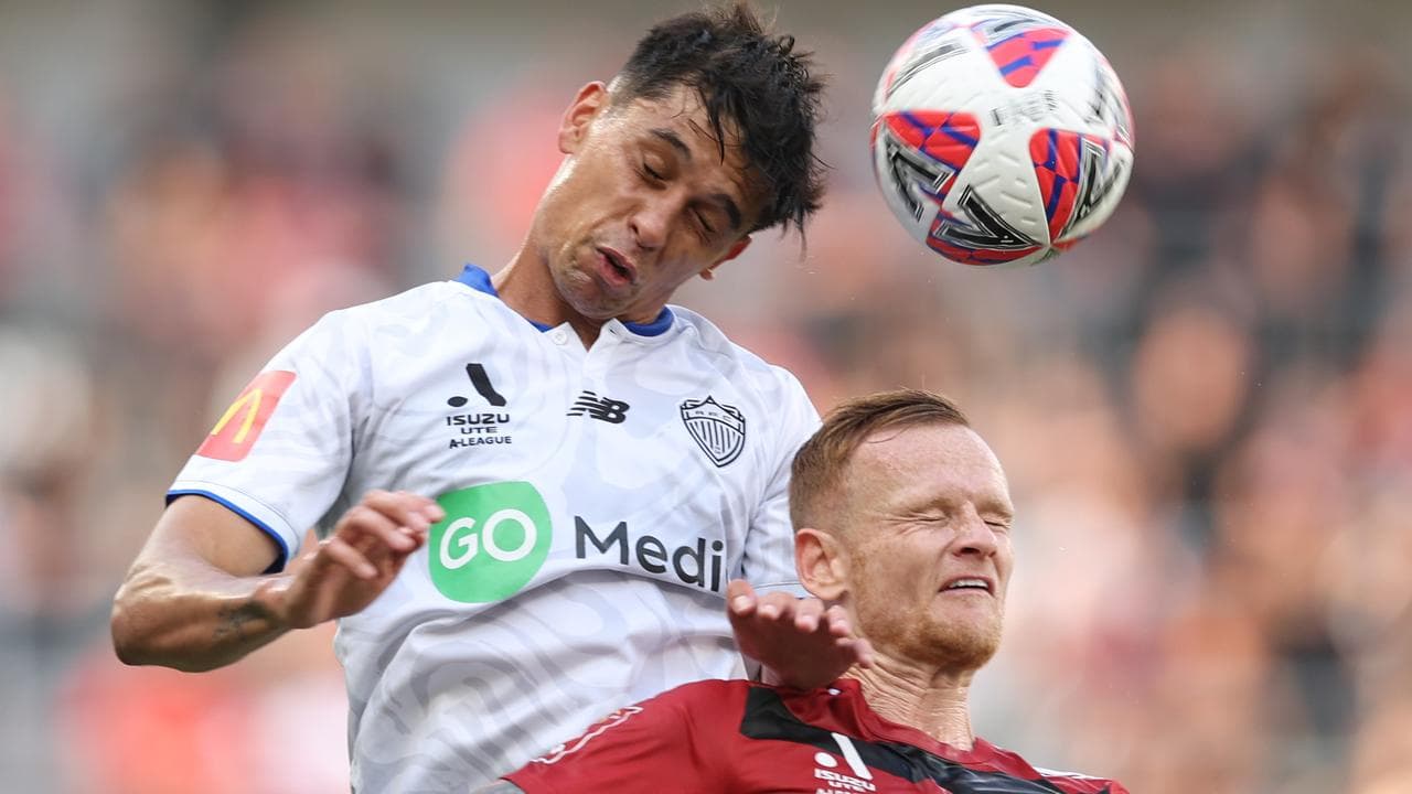 Soccer players go up for a header (file image)