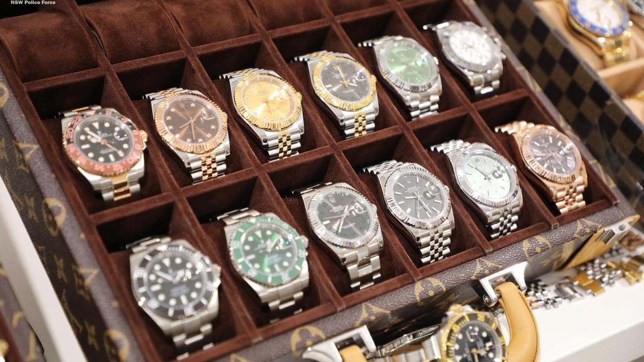 A display box of counterfeit luxury watches