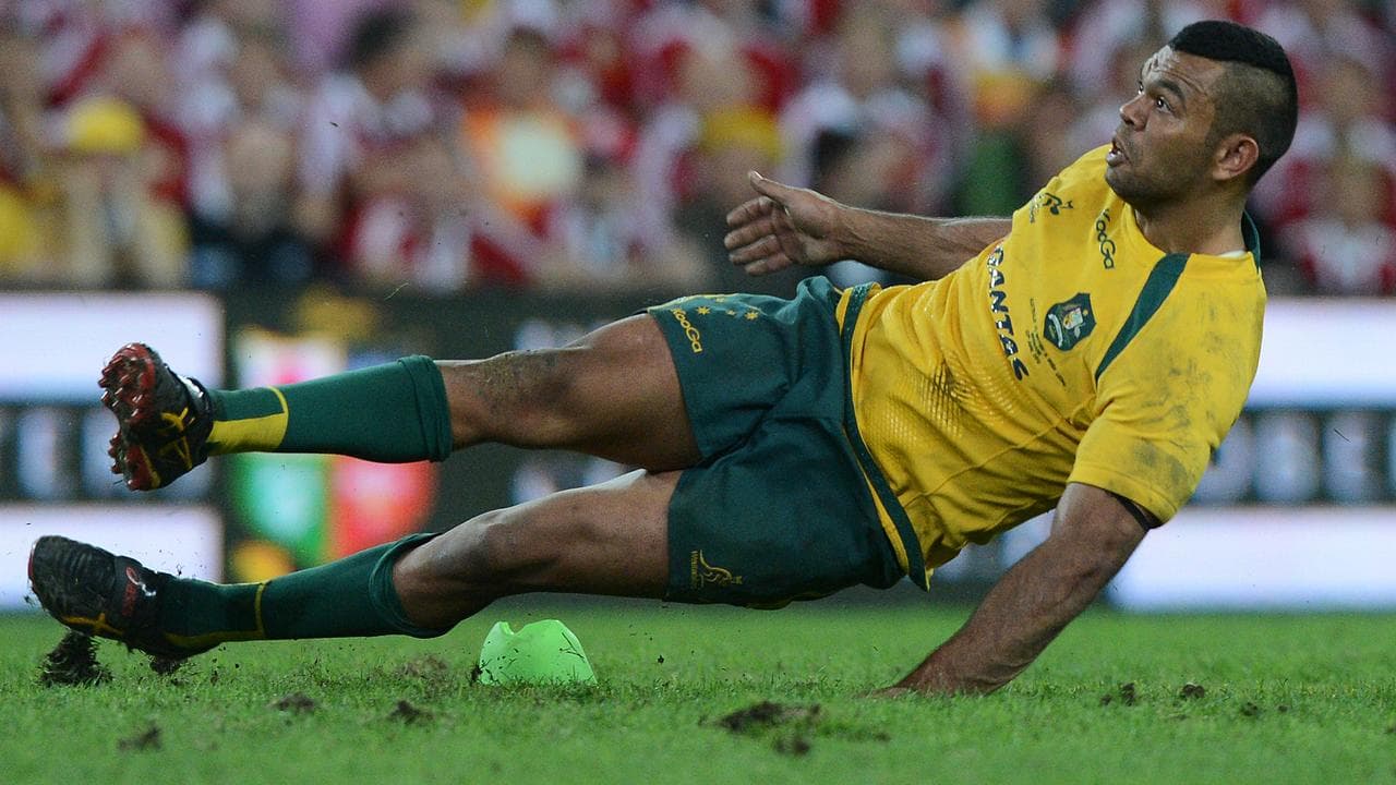 Wallabies player Kurtley Beale slips