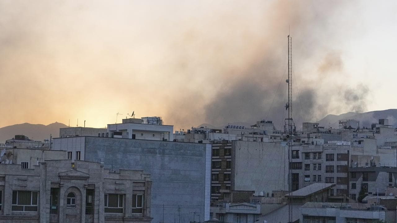 Smoke rises up after Israel's attack, in Tehran, Iran