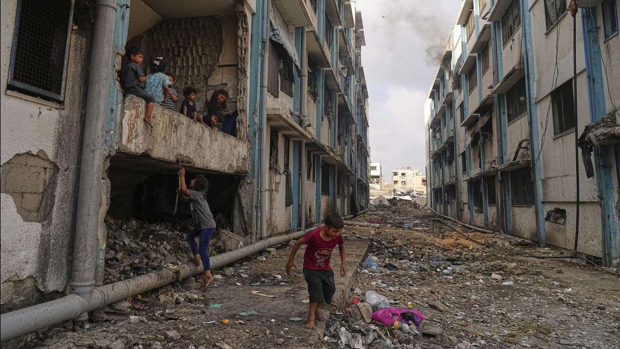 Displaced Palestinians live in a school run by UNRWA, Gaza City