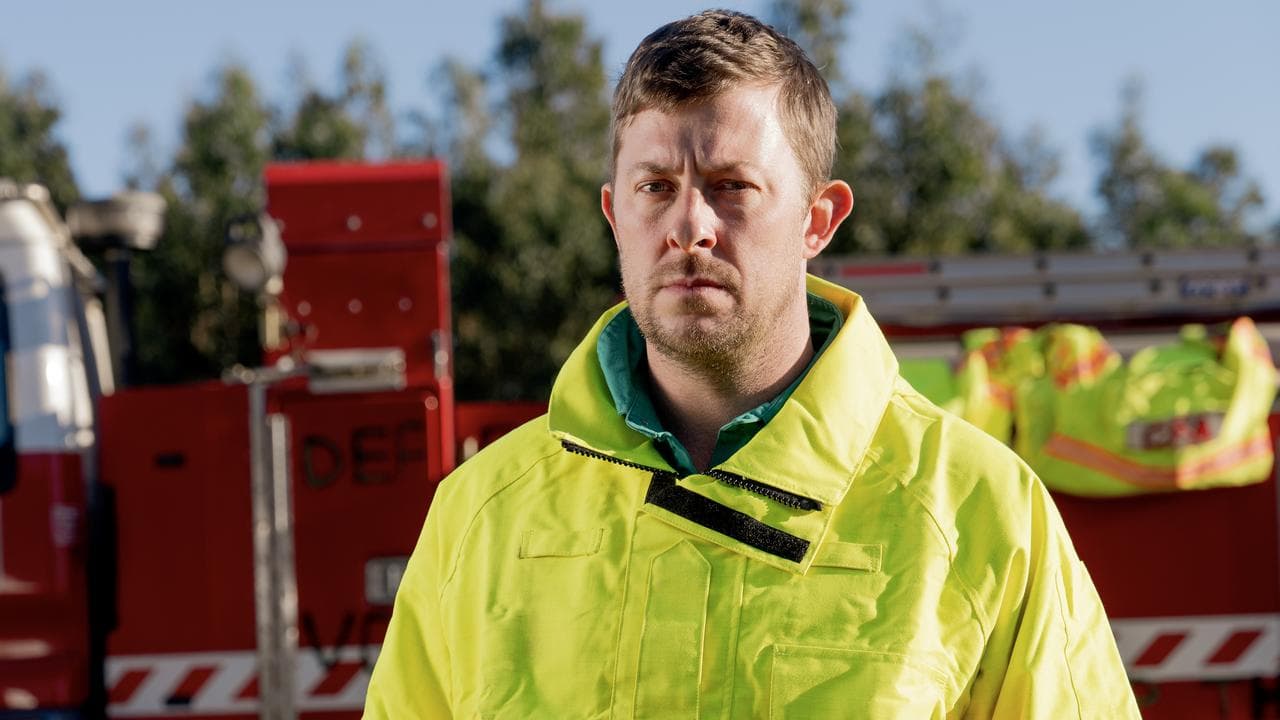 Farmer Brad Marson poses for a photograph