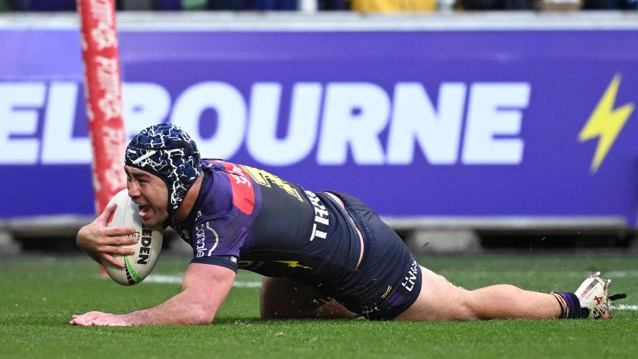 Jahrome Hughes of the Storm scores a try.