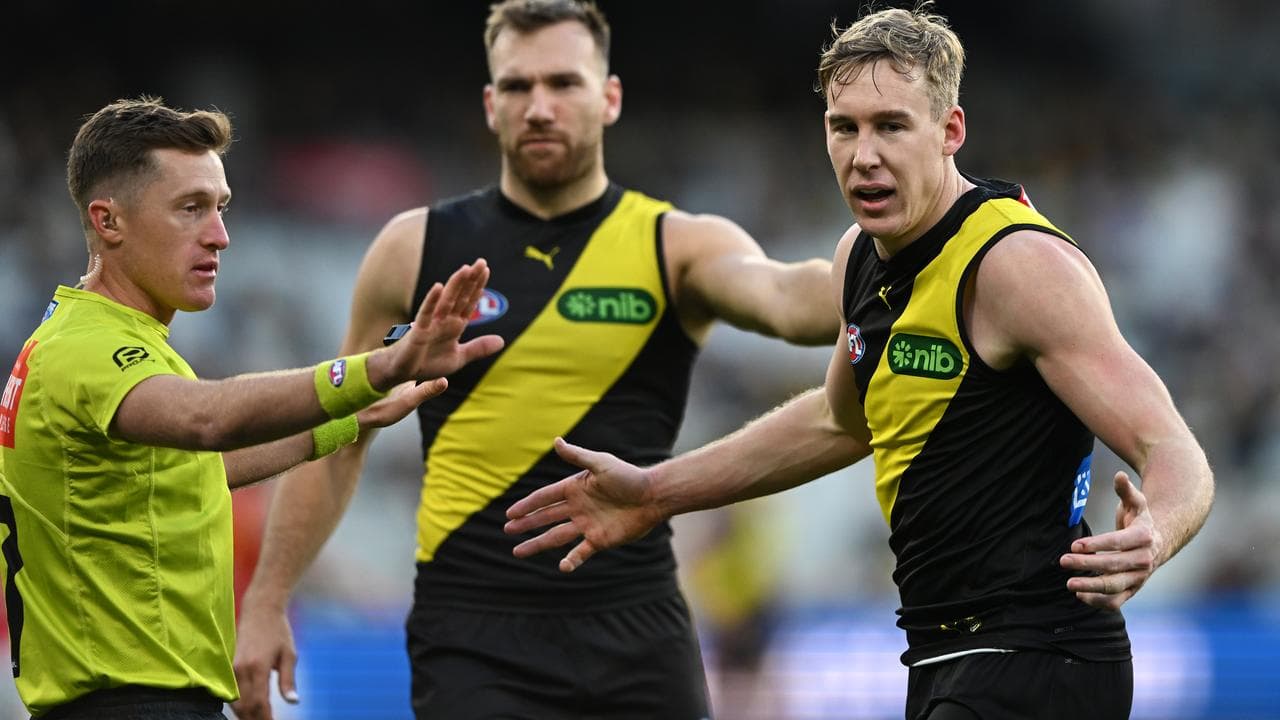 Richmond's Tom Lynch (right)