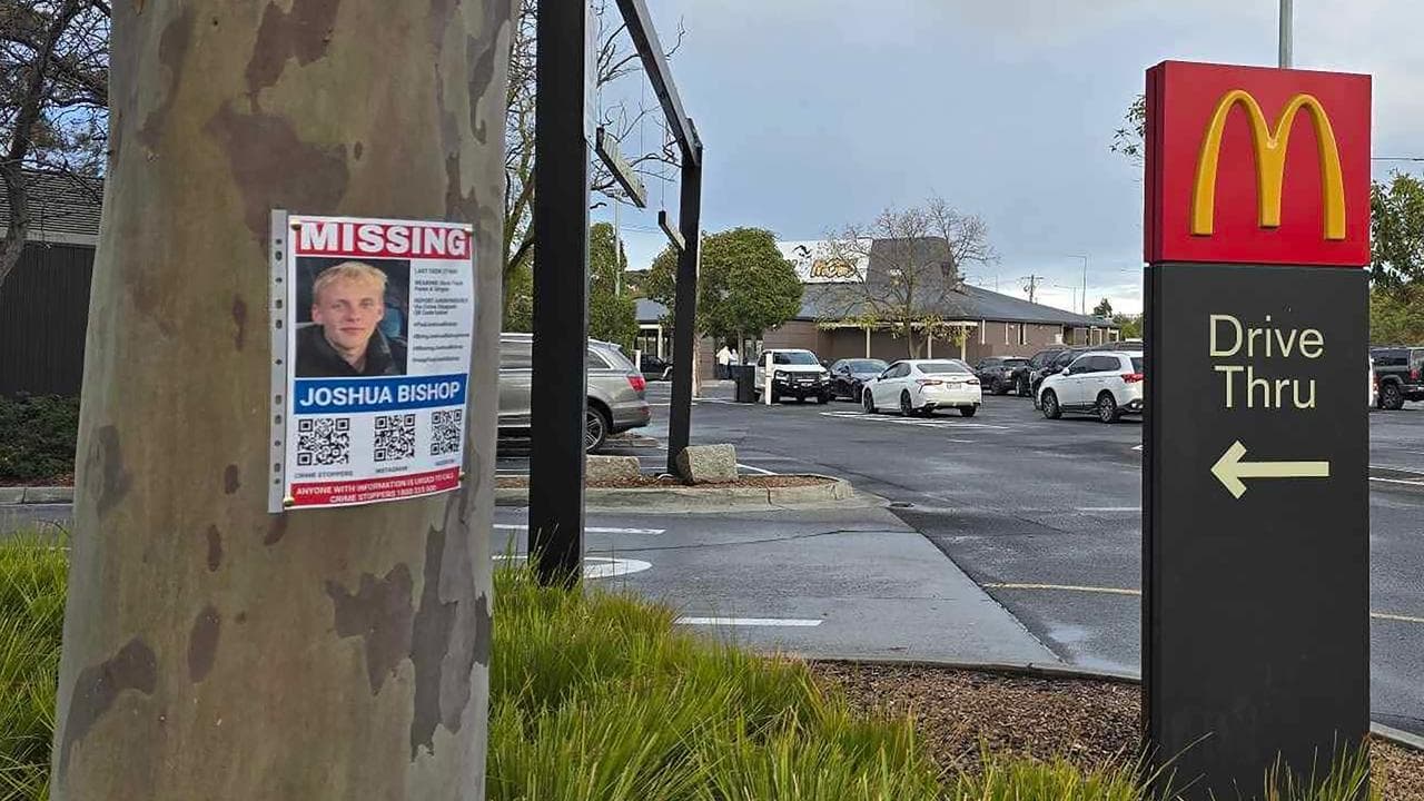 Missing person flyer on tree