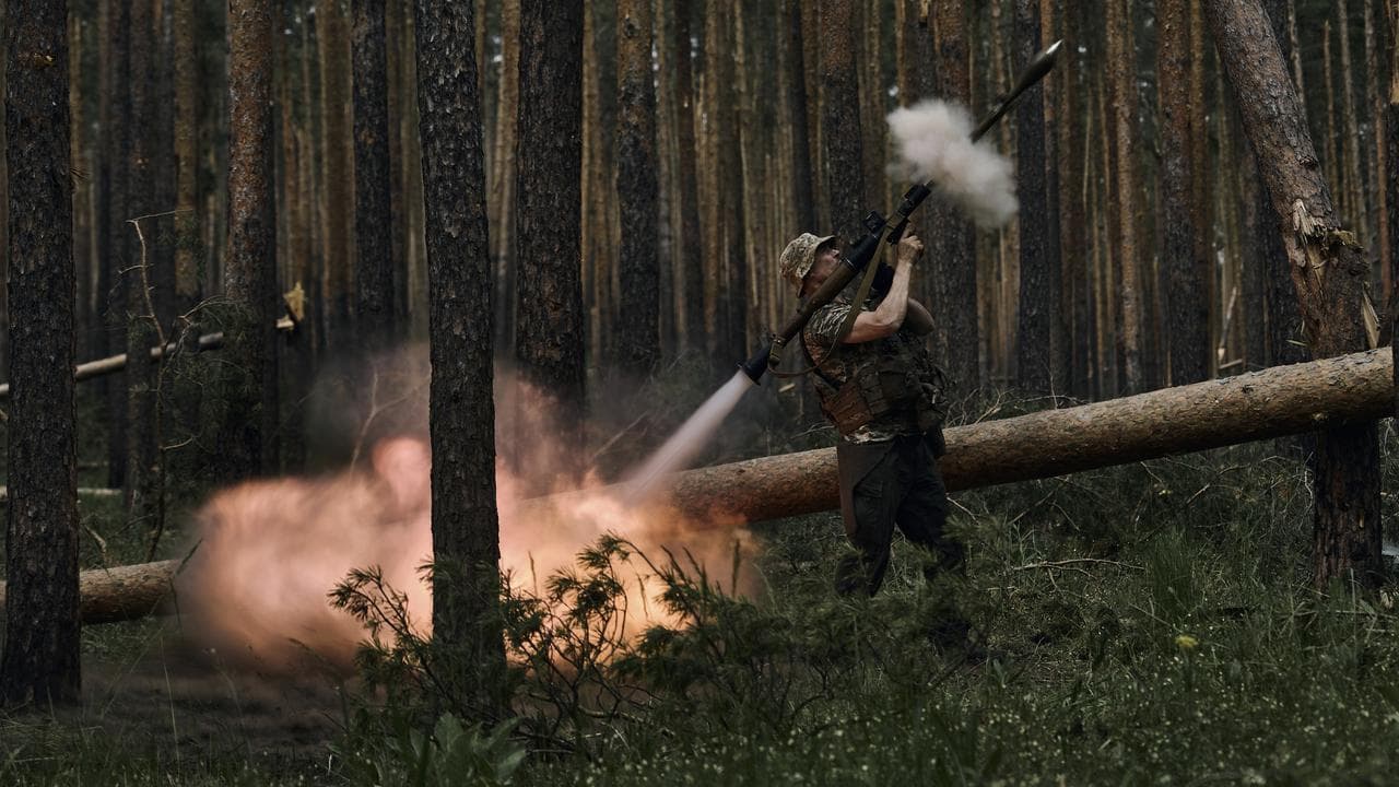 A Ukrainian soldier fires an RPG in the Luhansk region