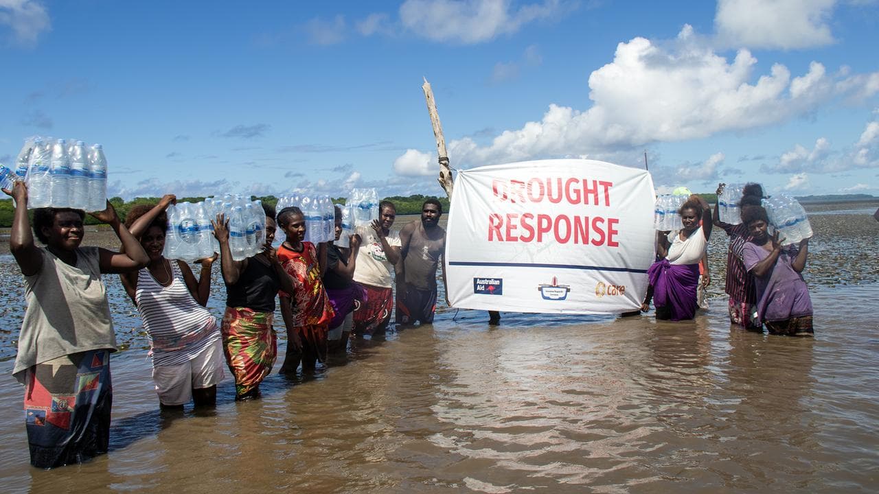 Moving relief water from charted vessel to shore at Mantoia Village