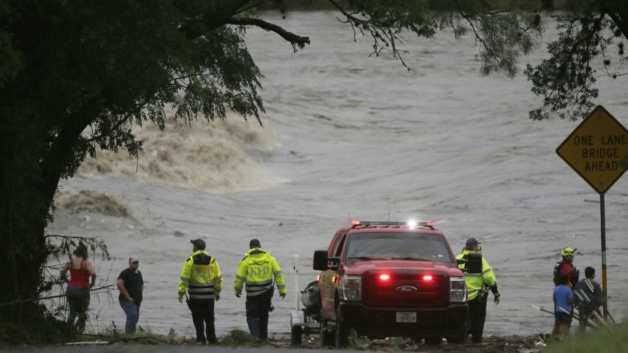Emergency personnel on the banks of the Guadalupe River