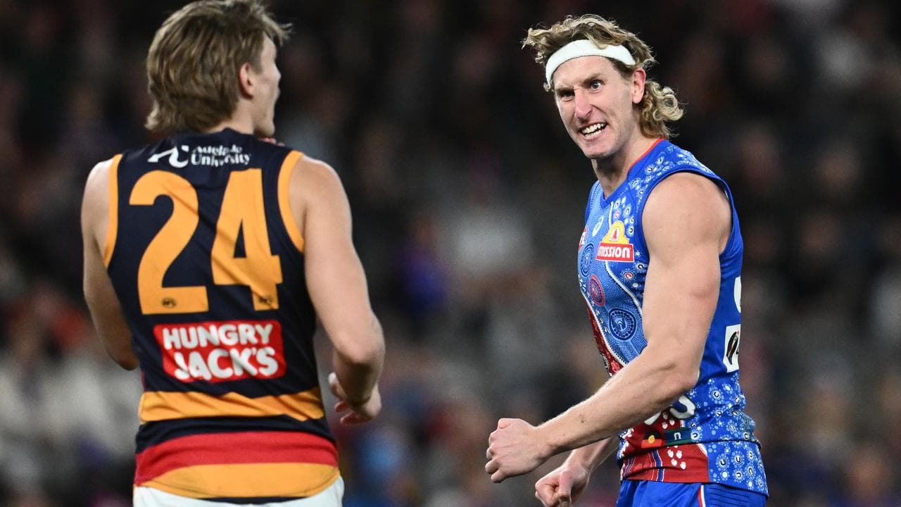 Western Bulldogs forward Aaron Naughton (right)