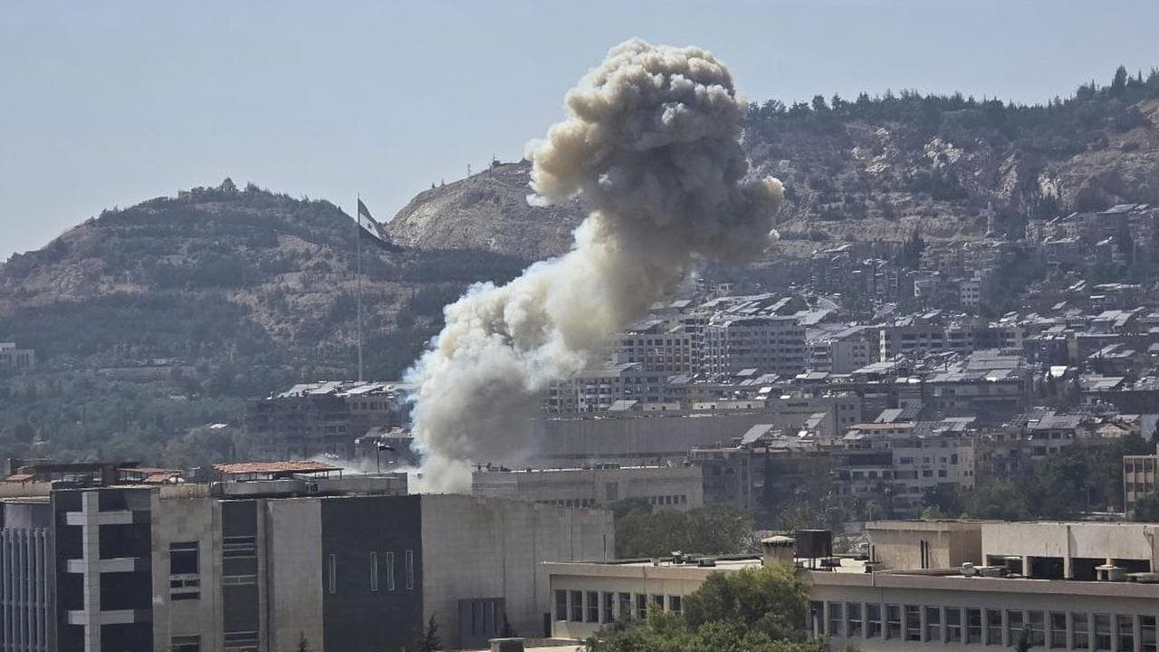 Smoke from an Israeli air strike on the Syrian defence ministry