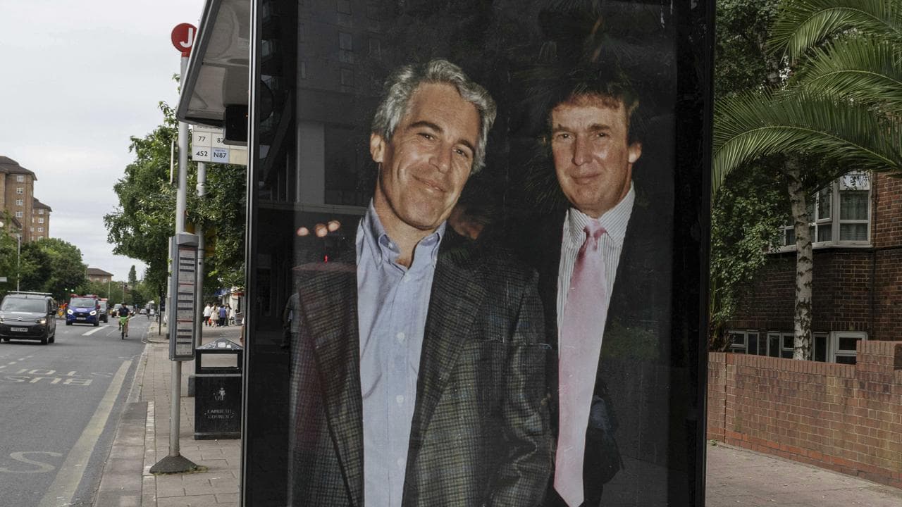 A billboard showing Epstein and Trump