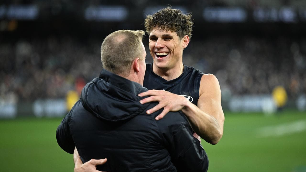 (L-R) Michael Voss and Charlie Curnow.